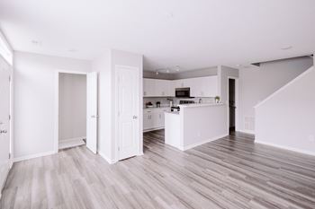 Modern white chef’s kitchen with upgraded appliances*